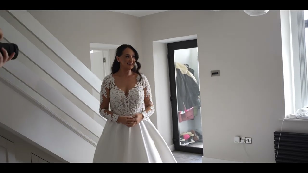 Courtney and Jamie together in their wedding highlight reel